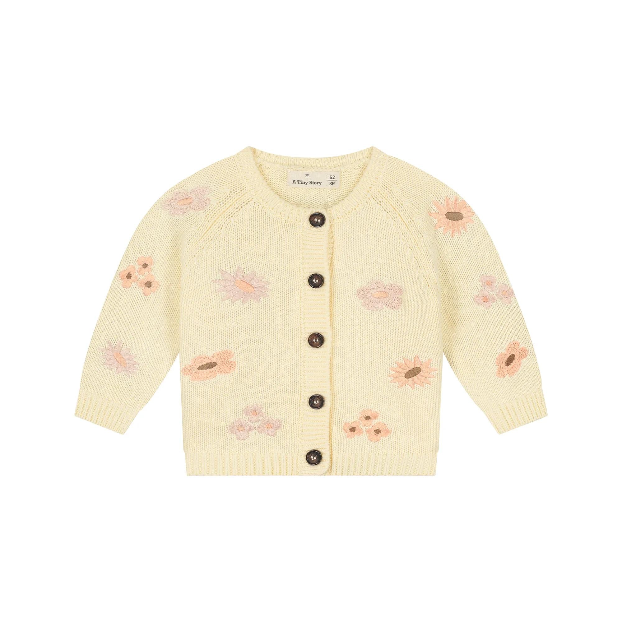 Cardigan bébé brodé ivory d’A Tiny Story