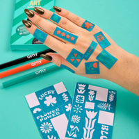 Feutres pour tatouages éphémères Tattoo Art Flower Power d’Omy – tatouage dessiné sur la peau